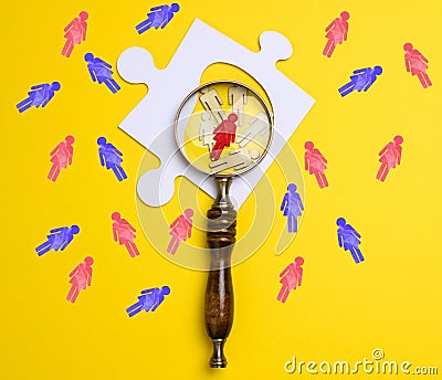 Search and selection of personnel in the company. Effective personnel management, leader identification. Magnifying glass and Stock Photo