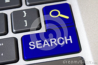 Search text on blue laptop keyboards. Web search concept Stock Photo