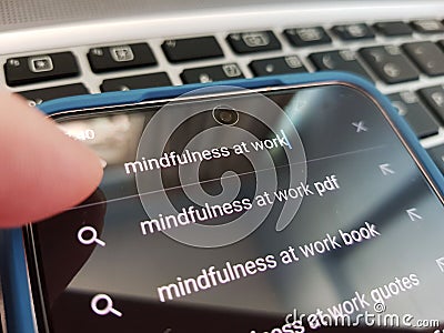 Searching for mindfulness at work with keyboard in background Stock Photo