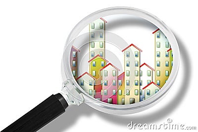 Searching new home - concept with a house seen by the magnifying glass Stock Photo