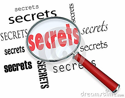 Searching for Secrets - Magnifying Glass Finds Clues Stock Photo