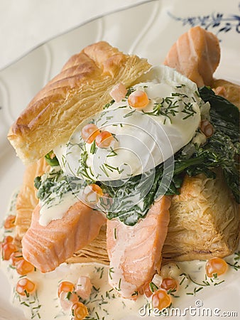 Seared Salmon Spinach and a Poached Egg Stock Photo