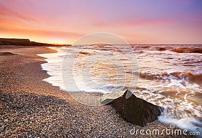 Seascape during bright sunrise Stock Photo