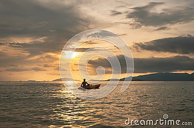 Seascape, a guy kayaking in ocean in sunset at tropical ocean in Thailand, travel vacation holidays concepts Editorial Stock Photo