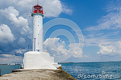 Seascape with lighthouse on the Black Sea in Odesa during the summer season Stock Photo