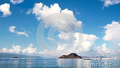 Seascape mountains with beautiful sky in white clouds. Stock Photo
