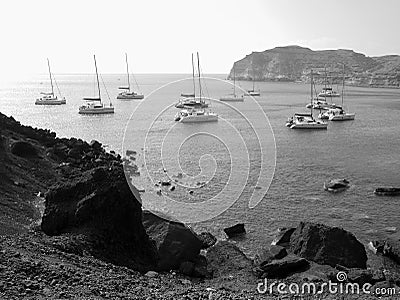 Seascape with sailboat, catamarans, sailing yachts near Red Beach. Santorini, Greece. Editorial Stock Photo