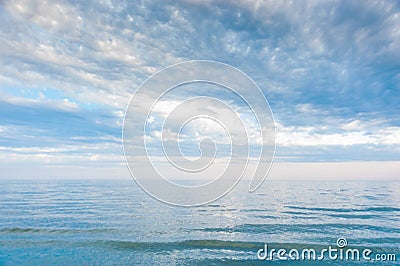 Seascape with sea horizon and blue sky. Background. Painterly seascape scene with relaxing sunset colours Stock Photo