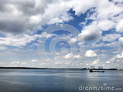 Seascape with a ship and clouds. Editorial Stock Photo