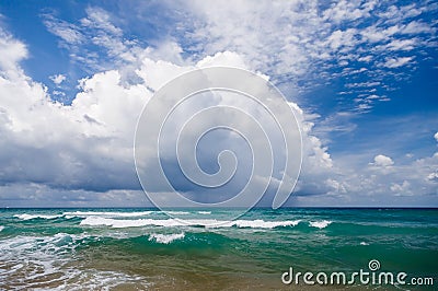 Seascape small waves with white foam on the background of blue water Stock Photo