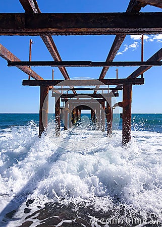 Under the abandoned pier. Stock Photo