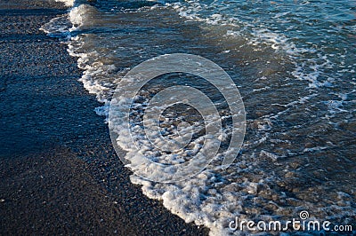 Seascape wave of the sea on the sandy beach Stock Photo