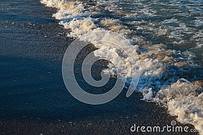 Seascape wave of the sea on the sandy beach Stock Photo