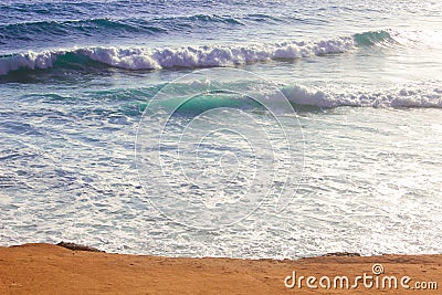 Seashore Waves and Mountain under the Sunshine in Matrouh, Egypt Stock Photo