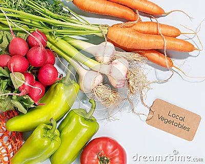 Season vegetables with label with inscription Local vegetables Stock Photo