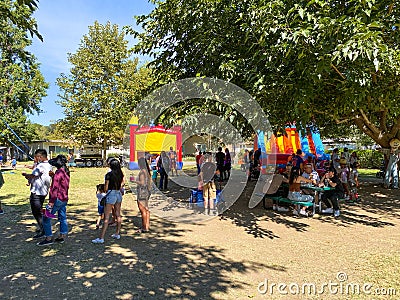 Seasonal adventures pumpkin patch festival. Food stand and rides for families, San Diego Editorial Stock Photo