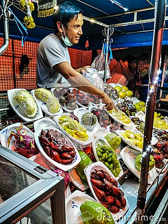 A seasonal fruits seller Editorial Stock Photo