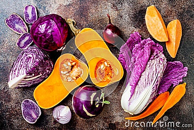 Seasonal winter autumn fall vegetables on rustic background. Plant based vegan or vegetarian cooking concept. Clean eating food Stock Photo