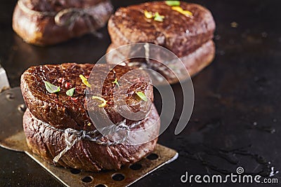 Seasoned grilled thick fillet steak medallion Stock Photo