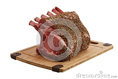 Seasoned pork foreloin on bamboo cutting board Stock Photo