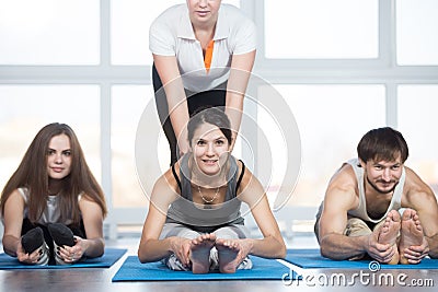 Seated forward bend pose Stock Photo