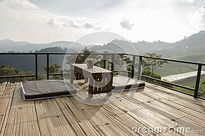 Seating overlooking the mountain on bamboo Stock Photo