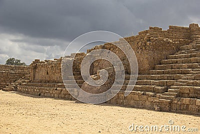 Amphitheater seats among the ruins of Caesarea Stock Photo