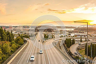 Seattle skylines and Interstate freeways converge with Elliott Bay and the waterfront background of in sunset time, Seattle, Washi Stock Photo