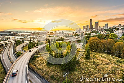 Seattle skylines and Interstate freeways converge with Elliott Bay and the waterfront background of in sunset time, Seattle, Washi Stock Photo