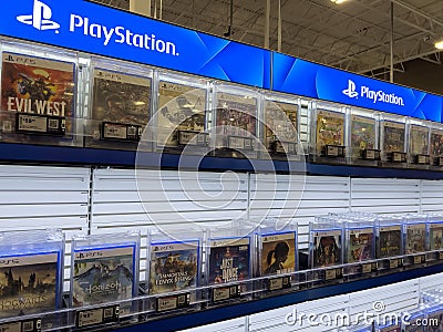 Seattle, WA USA - circa August 2023: Angled view of a selection of PS5 games for sale inside a Best Buy store Editorial Stock Photo