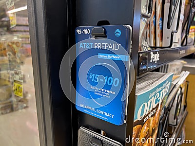 Seattle, WA USA - circa July 2023: Close up view of no contract prepaid phone cards for sale inside a QFC grocery store Editorial Stock Photo