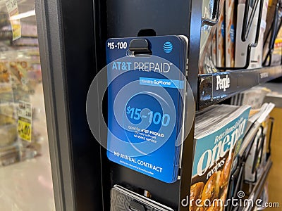 Seattle, WA USA - circa July 2023: Close up view of no contract prepaid phone cards for sale inside a QFC grocery store Editorial Stock Photo