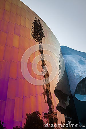 SEATTLE, WASHINGTON, USA - JULY 4, 2014: Distorted reflection of the Space Needle in the Museum of Pop Culture Editorial Stock Photo