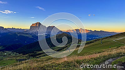 From Seceda peak in Italy's Dolomites, witness a breathtaking panorama. Trentino Alto Adige, Europe. Stock Photo