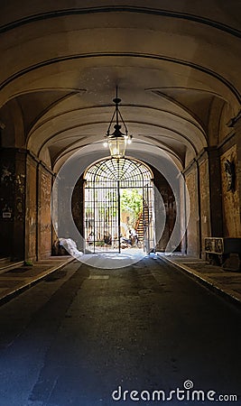 Secluded Italian gateway that keeps all the beauty beyond and hidden. Stock Photo