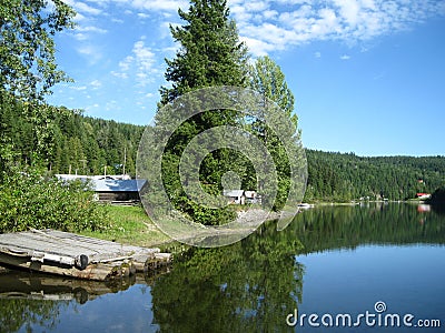 Secluded lake cabins Stock Photo