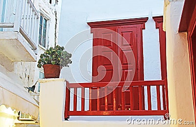 Second Floor Red Door in Mykonos, Greece. Stock Photo