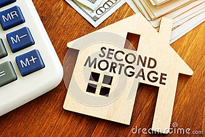 Second Mortgage written on model of home Stock Photo