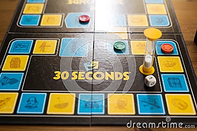 30 seconds board game, very fast party game, play in teams family or friend`s activity Editorial Stock Photo