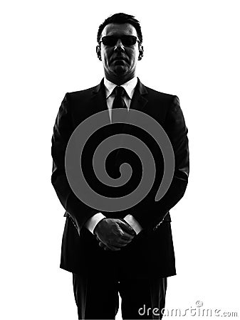 Secret service security bodyguard agent man silhouette Stock Photo