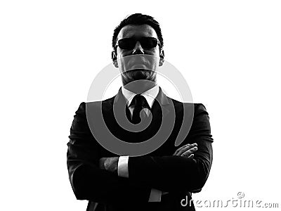 Secret service security bodyguard agent man silhou Stock Photo