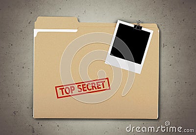 A manila folder with the faded words Top Secret on Stock Photo