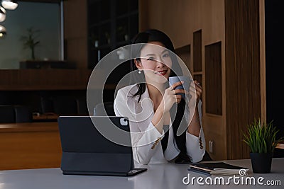 Secretary answering telephone and make an appointment client. Stock Photo