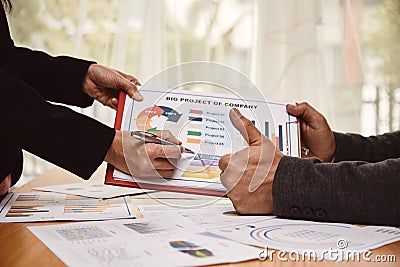 Secretary present big project report to executive managing director showing thumb up Stock Photo