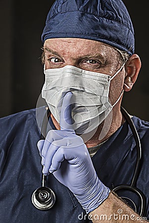 Secretive Doctor Wearing Protective Head Wear Stock Photo