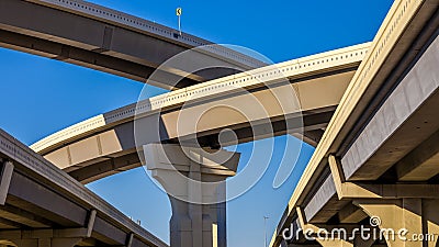 Section of elevated highway with several levels against a bright Stock Photo