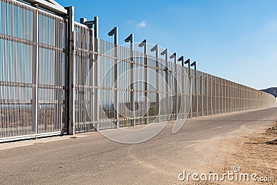 Section of Inner International Border Wall Separating San Diego and Tijuana Stock Photo