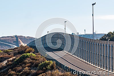 Section of International Border Wall Between San Diego/Tijuana Stock Photo