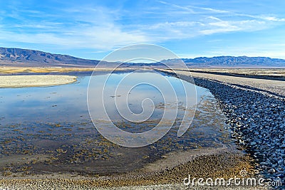 A section of Owens Lake being rehydrated as part of the dust mitigation project in California, USA Stock Photo
