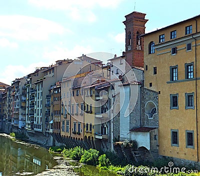 Section of the south bank of the Arno in Florence with old colourful houses facing the river Stock Photo